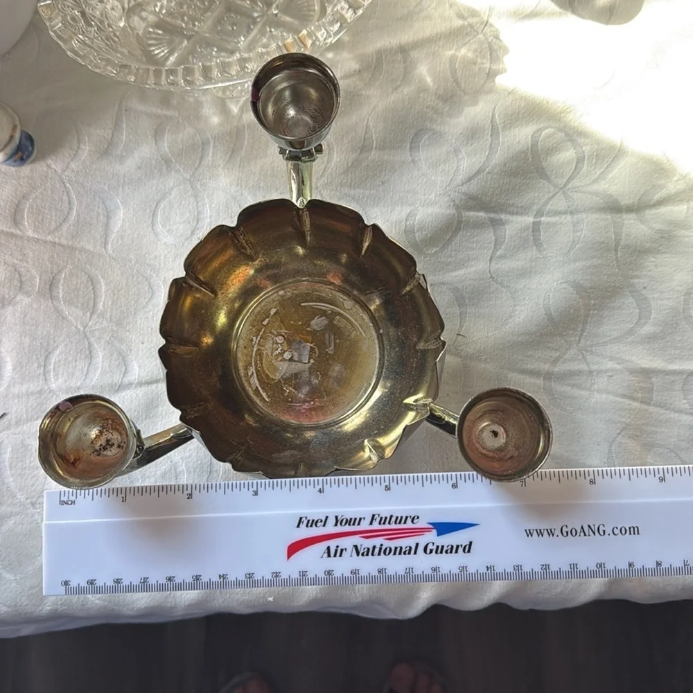 vintage Reed & Barton silver-plated 3-arm candle holder in a lotus flower design